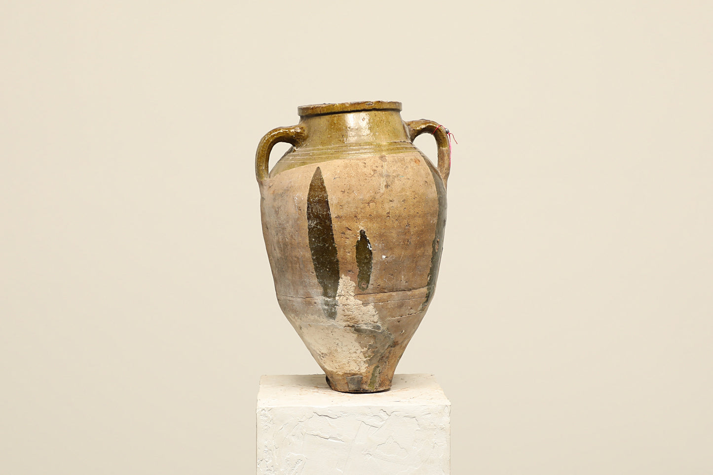 A one-of-a-kind clay brown Turkish vintage vase pot with two handles, crafted from terra cotta clay, this piece showcases timeless quality and antique craftsmanship, adding a unique touch of history to your space