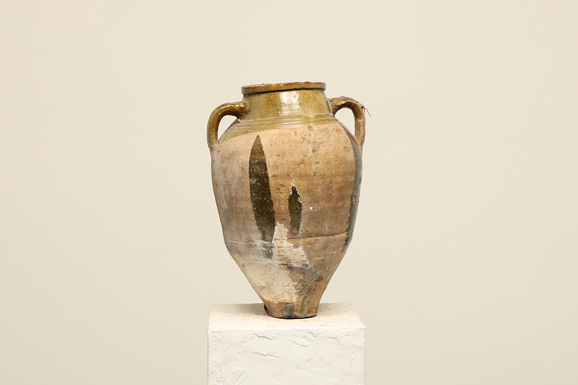 A one-of-a-kind clay brown Turkish vintage vase pot with two handles, crafted from terra cotta clay, this piece showcases timeless quality and antique craftsmanship, adding a unique touch of history to your space