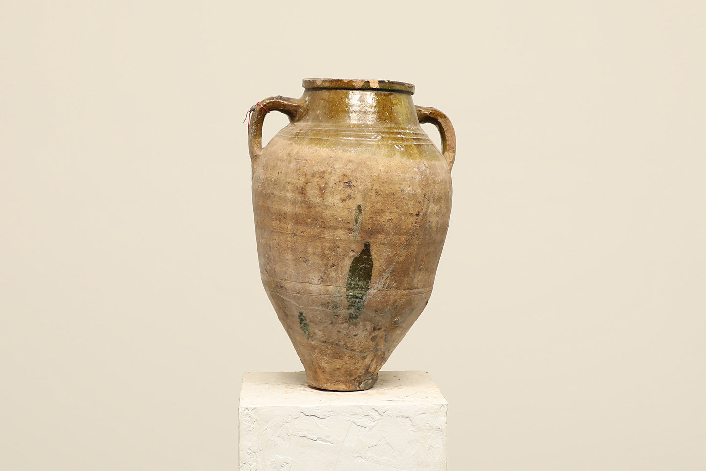 A one-of-a-kind clay brown Turkish vintage vase pot with two handles, crafted from terra cotta clay, this piece showcases timeless quality and antique craftsmanship, adding a unique touch of history to your space