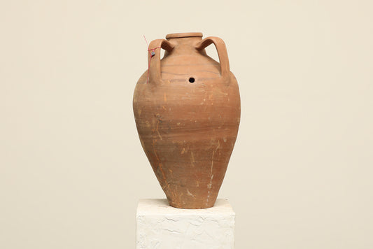 A one-of-a-kind clay brown Turkish vintage vase pot with two handles, crafted from terra cotta clay, this piece showcases timeless quality and antique craftsmanship, adding a unique touch of history to your space