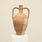 A one-of-a-kind clay brown Turkish vintage vase pot with two handles, crafted from terra cotta clay, this piece showcases timeless quality and antique craftsmanship, adding a unique touch of history to your space