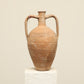 A one-of-a-kind clay brown Turkish vintage vase pot with two handles, crafted from terra cotta clay, this piece showcases timeless quality and antique craftsmanship, adding a unique touch of history to your space