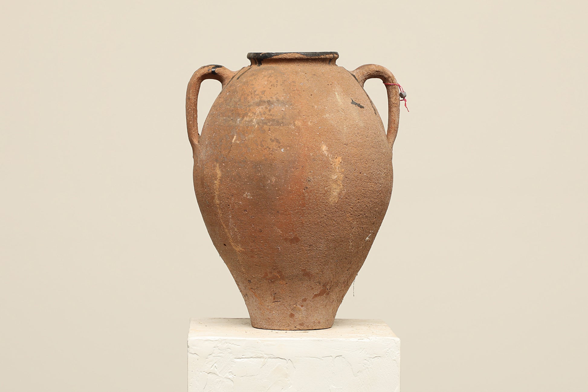 A one-of-a-kind clay brown Turkish vintage vase pot with two handles, crafted from terra cotta clay, this piece showcases timeless quality and antique craftsmanship, adding a unique touch of history to your space