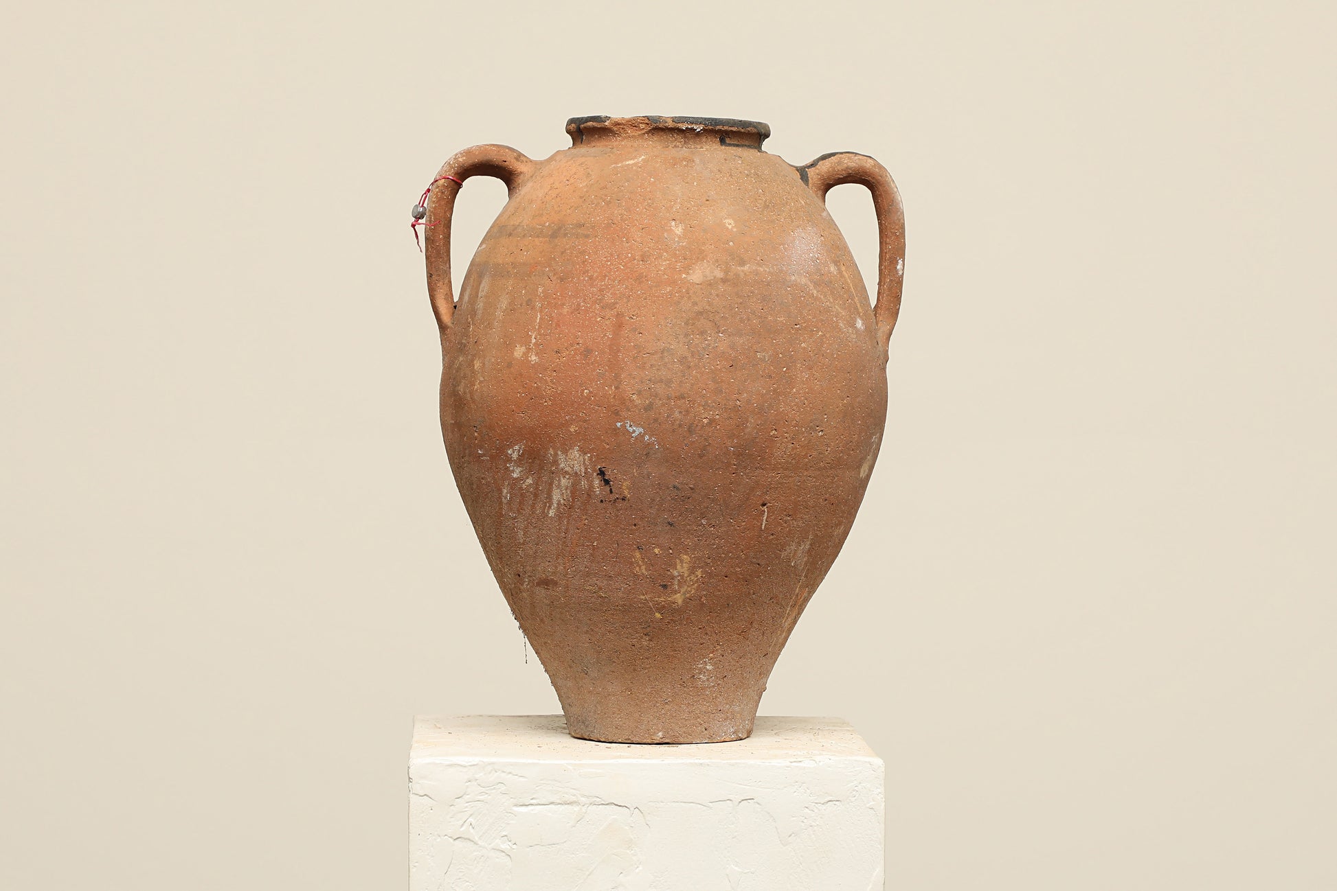A one-of-a-kind clay brown Turkish vintage vase pot with two handles, crafted from terra cotta clay, this piece showcases timeless quality and antique craftsmanship, adding a unique touch of history to your space