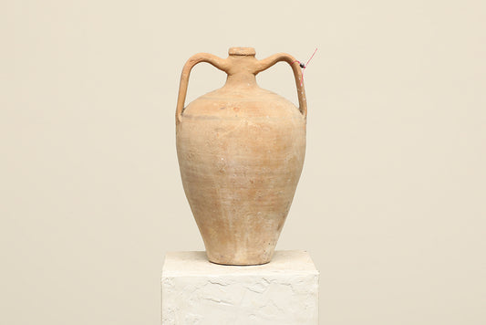 A one-of-a-kind clay brown Turkish vintage vase pot with two handles, crafted from terra cotta clay, this piece showcases timeless quality and antique craftsmanship, adding a unique touch of history to your space