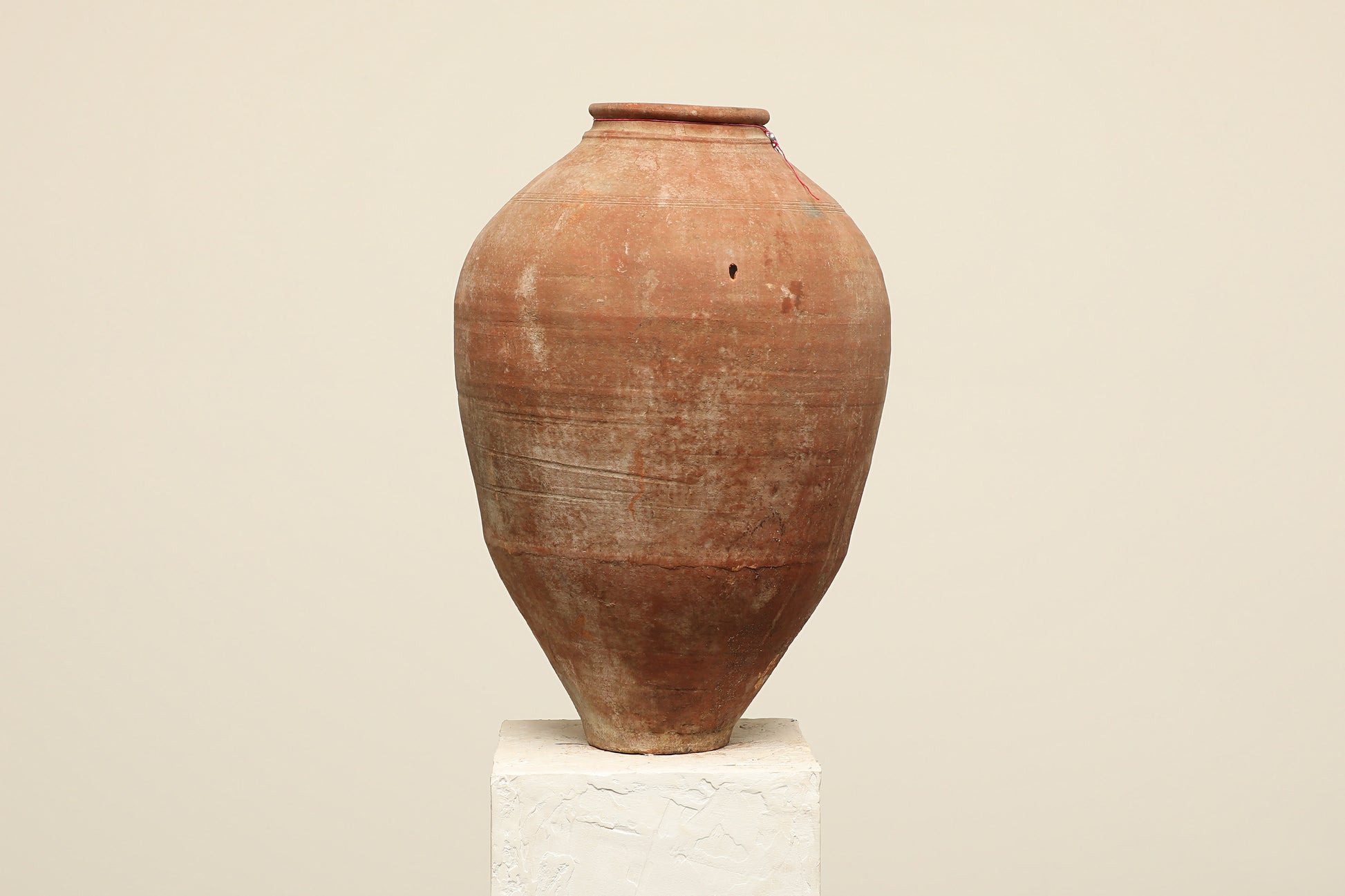 A one-of-a-kind clay brown Turkish vintage vase pot without a handle, crafted from terra cotta clay, this piece showcases timeless quality and antique craftsmanship, adding a unique touch of history to your space