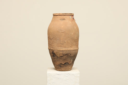 A one-of-a-kind clay brown Turkish vintage vase pot without a handle, crafted from terra cotta clay, this piece showcases timeless quality and antique craftsmanship, adding a unique touch of history to your space
