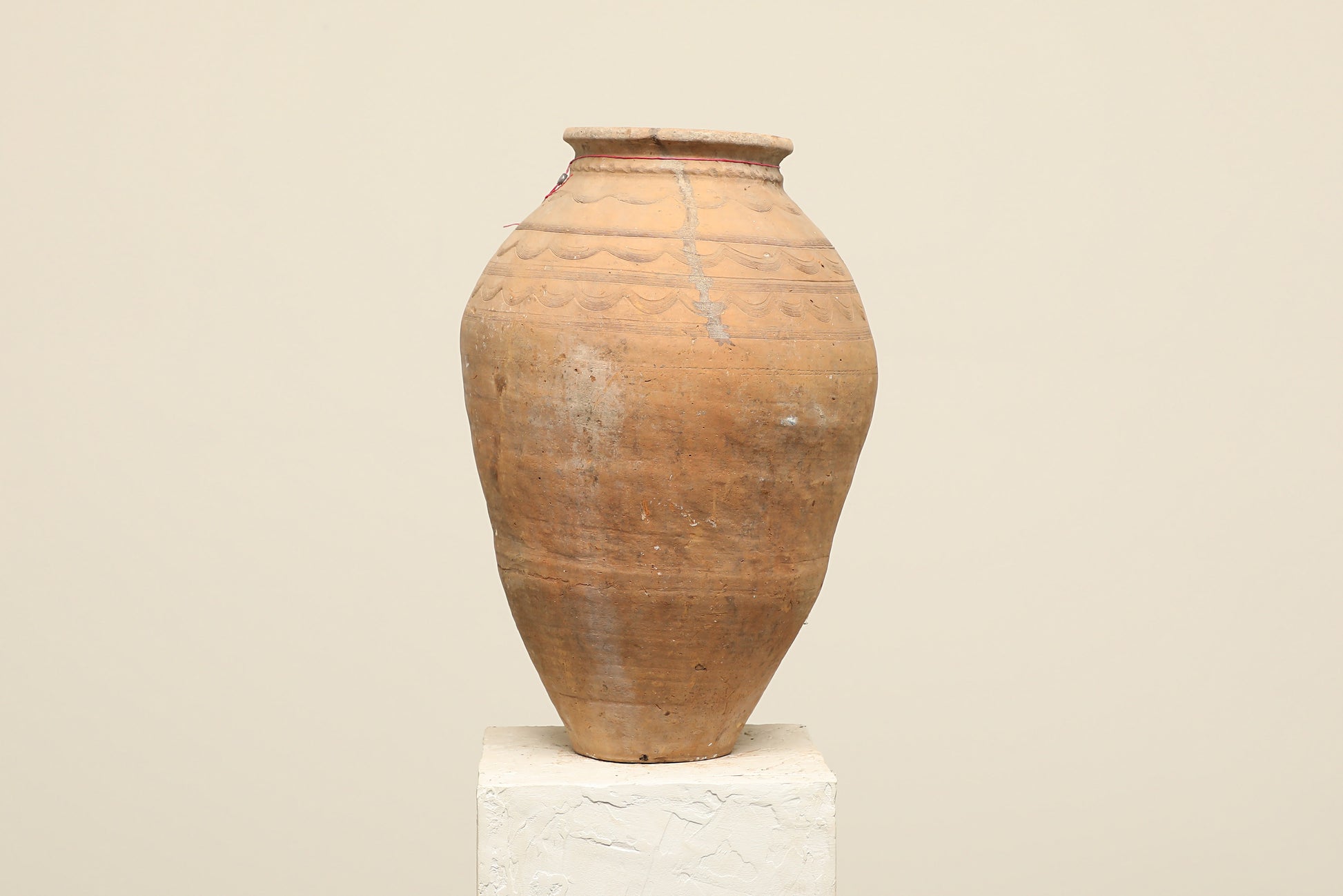 A one-of-a-kind clay brown Turkish vintage vase pot without a handle, crafted from terra cotta clay, this piece showcases timeless quality and antique craftsmanship, adding a unique touch of history to your space