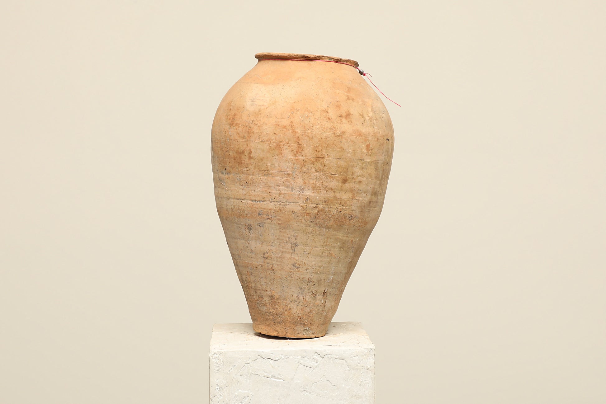 A one-of-a-kind clay brown Turkish vintage vase pot without a handle, crafted from terra cotta clay, this piece showcases timeless quality and antique craftsmanship, adding a unique touch of history to your space