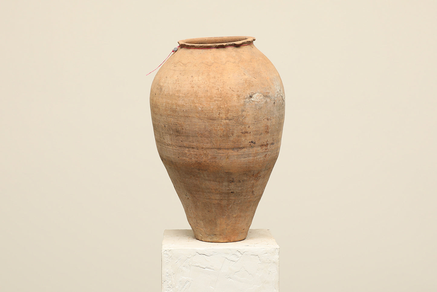 A one-of-a-kind clay brown Turkish vintage vase pot without a handle, crafted from terra cotta clay, this piece showcases timeless quality and antique craftsmanship, adding a unique touch of history to your space