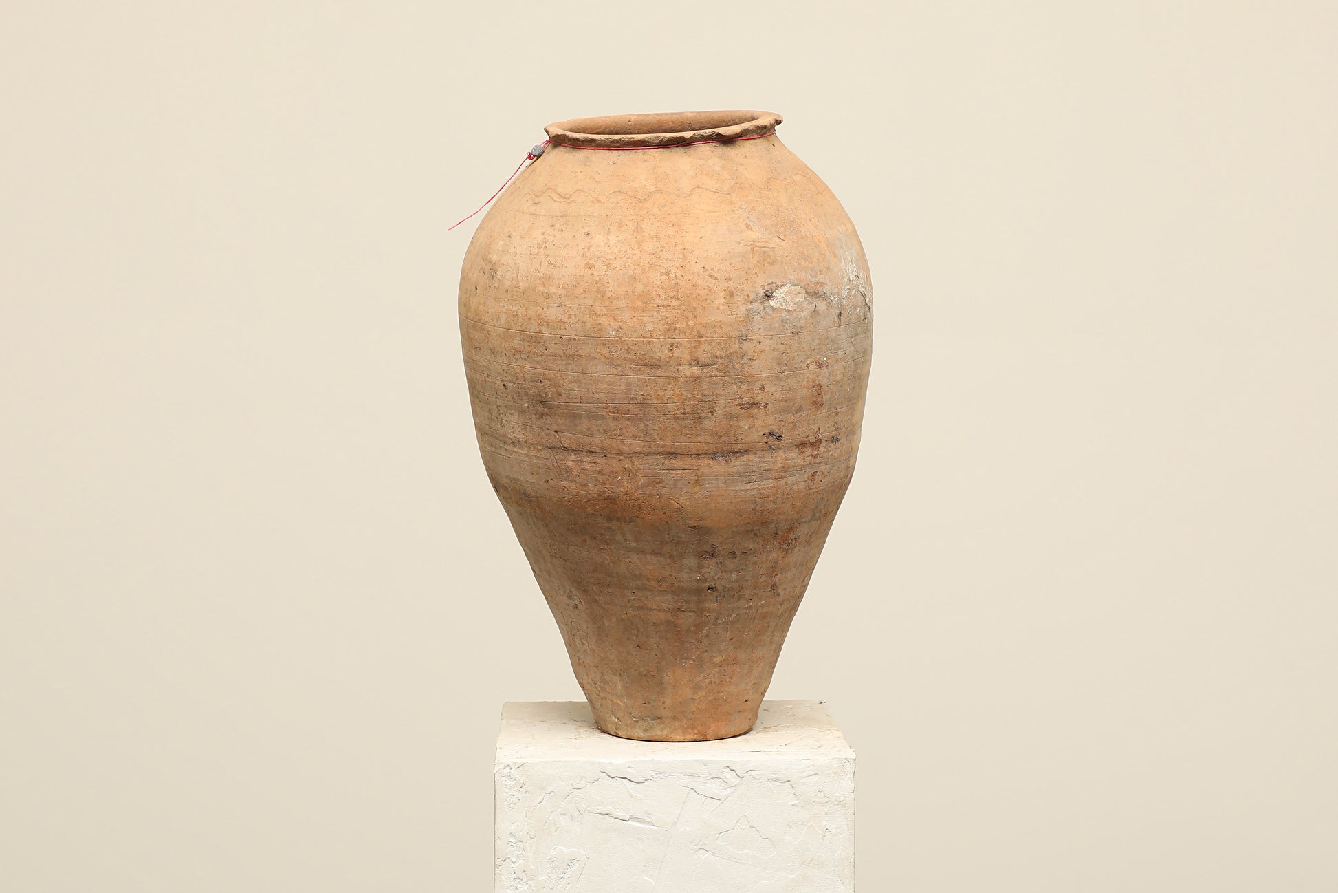 A one-of-a-kind clay brown Turkish vintage vase pot without a handle, crafted from terra cotta clay, this piece showcases timeless quality and antique craftsmanship, adding a unique touch of history to your space