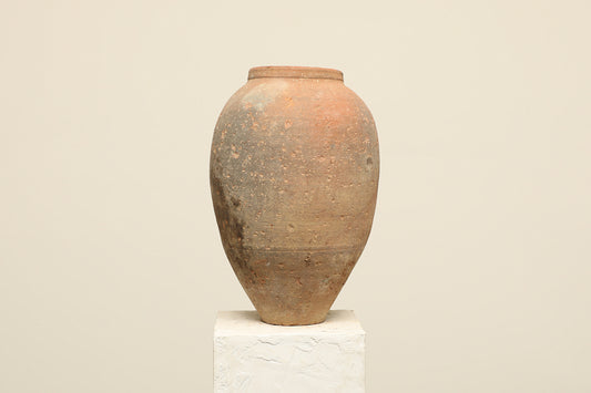 A one-of-a-kind clay brown Turkish vintage vase pot without a handle, crafted from terra cotta clay, this piece showcases timeless quality and antique craftsmanship, adding a unique touch of history to your space