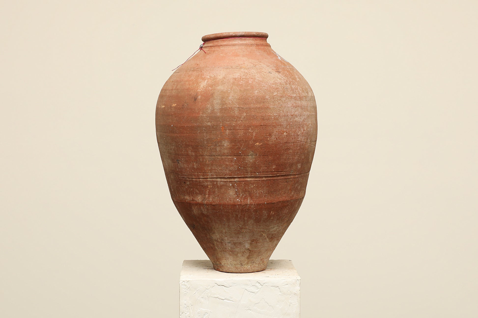A one-of-a-kind clay brown Turkish vintage vase pot without a handle, crafted from terra cotta clay, this piece showcases timeless quality and antique craftsmanship, adding a unique touch of history to your space