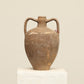 A one-of-a-kind dark brown Turkish vintage vase pot with two handles, crafted from terra cotta clay, this piece showcases timeless quality and antique craftsmanship, adding a unique touch of history to your space