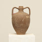 A one-of-a-kind dark brown Turkish vintage vase pot with two handles, crafted from terra cotta clay, this piece showcases timeless quality and antique craftsmanship, adding a unique touch of history to your space