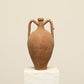 A one-of-a-kind dark brown Turkish vintage vase pot with two handles, crafted from terra cotta clay, this piece showcases timeless quality and antique craftsmanship, adding a unique touch of history to your space