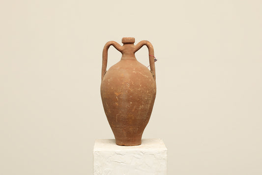 A one-of-a-kind dark brown Turkish vintage vase pot with two handles, crafted from terra cotta clay, this piece showcases timeless quality and antique craftsmanship, adding a unique touch of history to your space
