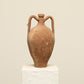 A one-of-a-kind dark brown Turkish vintage vase pot with two handles, crafted from terra cotta clay, this piece showcases timeless quality and antique craftsmanship, adding a unique touch of history to your space