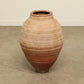A one-of-a-kind dark brown Turkish vintage vase pot without a handle, crafted from terra cotta clay, this piece showcases timeless quality and antique craftsmanship, adding a unique touch of history to your space