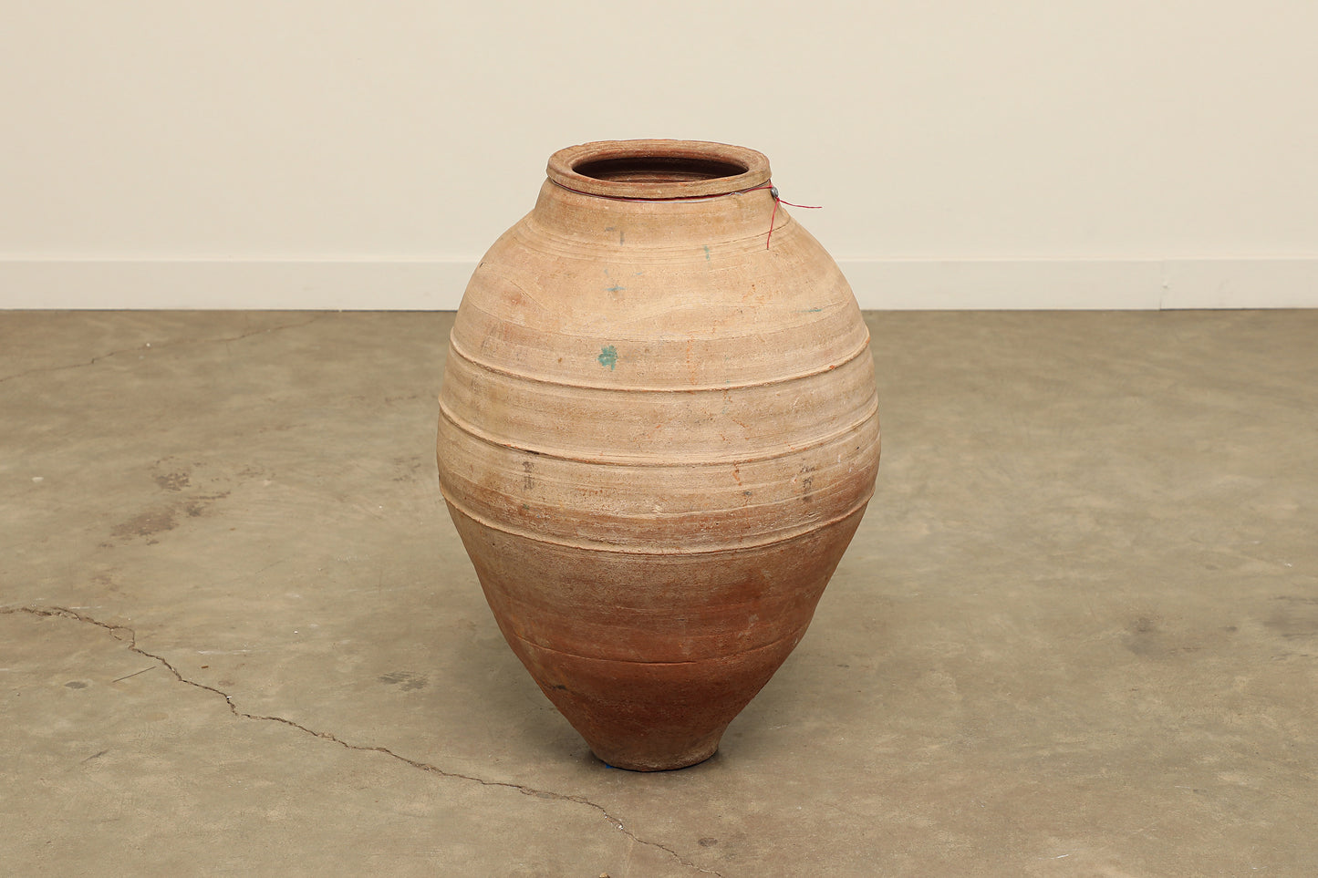 A one-of-a-kind dark brown Turkish vintage vase pot without a handle, crafted from terra cotta clay, this piece showcases timeless quality and antique craftsmanship, adding a unique touch of history to your space