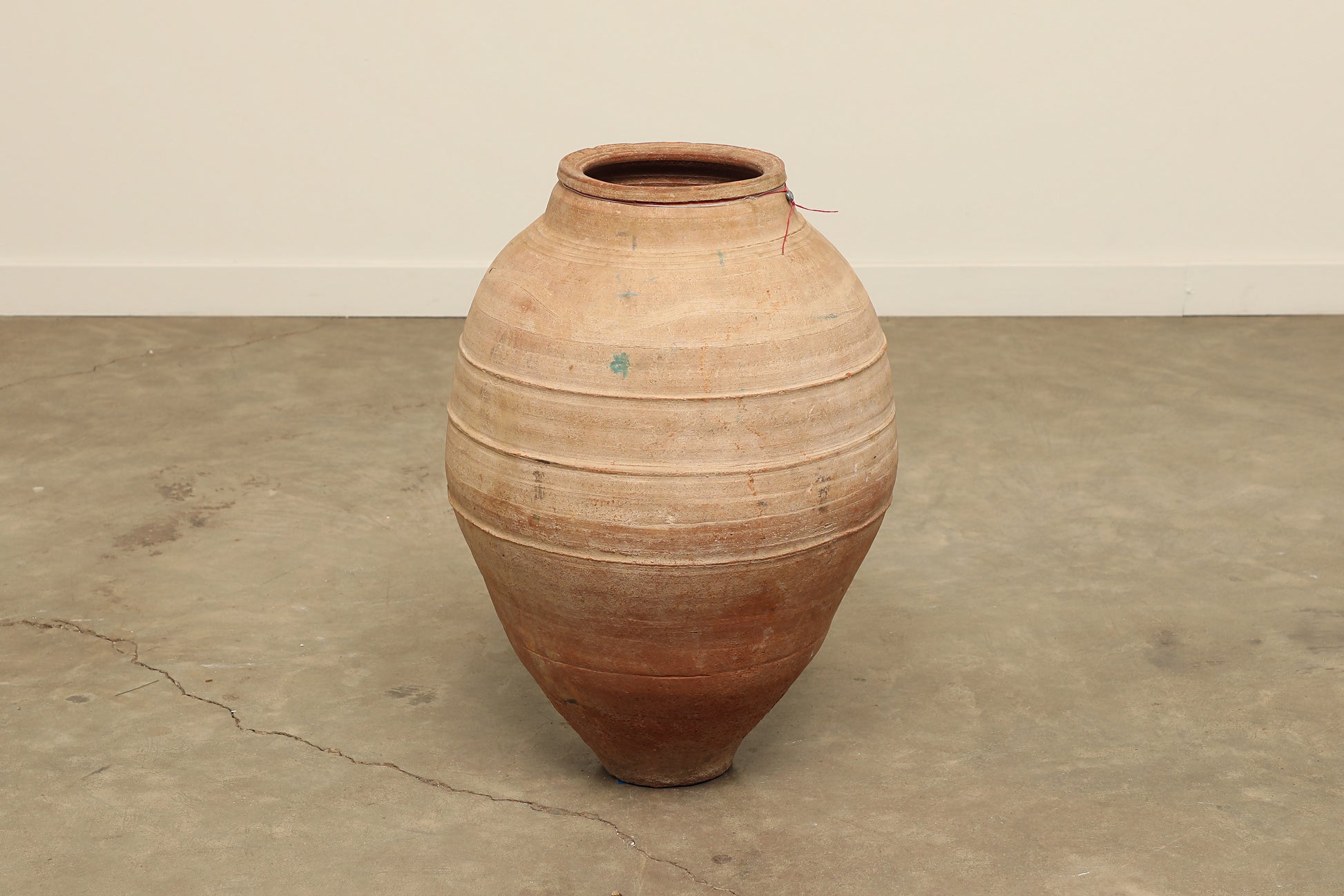 A one-of-a-kind dark brown Turkish vintage vase pot without a handle, crafted from terra cotta clay, this piece showcases timeless quality and antique craftsmanship, adding a unique touch of history to your space