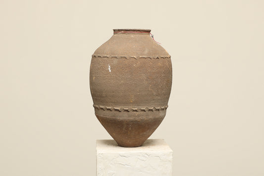 A one-of-a-kind dark brown Turkish vintage vase pot without a handle, crafted from terra cotta clay, this piece showcases timeless quality and antique craftsmanship, adding a unique touch of history to your space