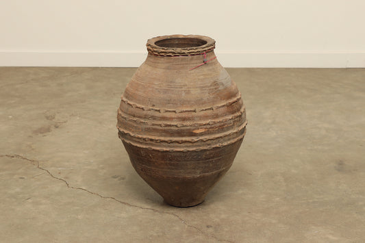 A one-of-a-kind dark brown Turkish vintage vase pot without a handle, crafted from terra cotta clay, this piece showcases timeless quality and antique craftsmanship, adding a unique touch of history to your space