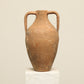 A one-of-a-kind rustic red Turkish vintage vase pot with two handles, crafted from terra cotta clay, this piece showcases timeless quality and antique craftsmanship, adding a unique touch of history to your space