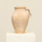 A one-of-a-kind natural Turkish vintage vase pot with a handle, crafted from terra cotta clay, this piece showcases timeless quality and antique craftsmanship, adding a unique touch of history to your space