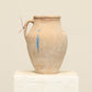 A one-of-a-kind natural Turkish vintage vase pot with a handle, crafted from terra cotta clay, this piece showcases timeless quality and antique craftsmanship, adding a unique touch of history to your space