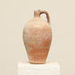 A one-of-a-kind natural Turkish vintage vase pot with a handle, crafted from terra cotta clay, this piece showcases timeless quality and antique craftsmanship, adding a unique touch of history to your space