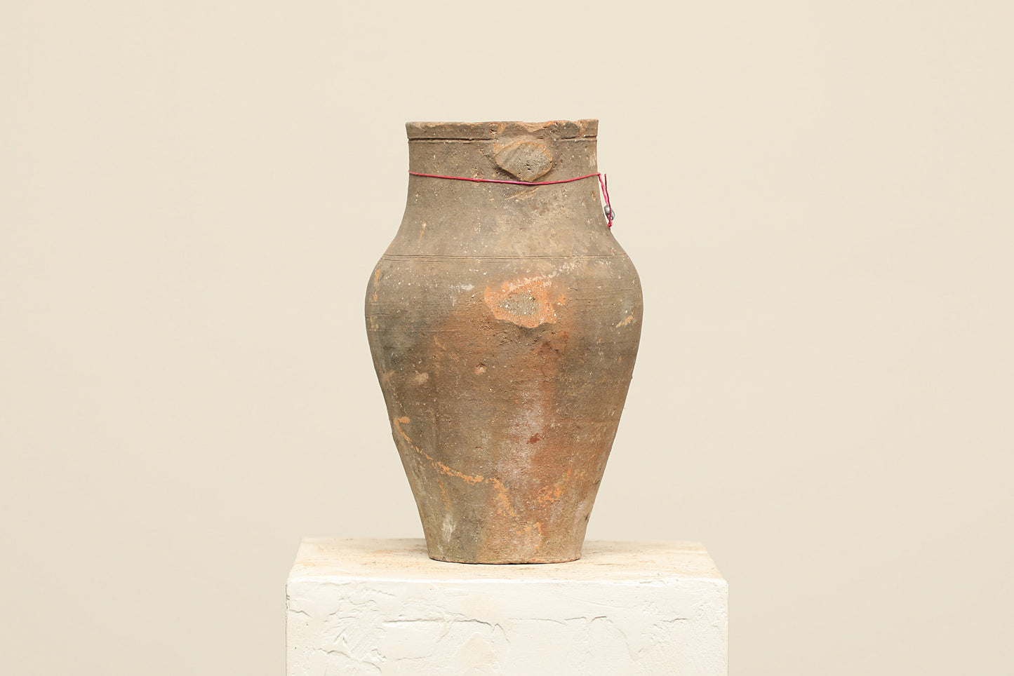 A one-of-a-kind natural Turkish vintage vase pot without a handle, crafted from terra cotta clay, this piece showcases timeless quality and antique craftsmanship, adding a unique touch of history to your space