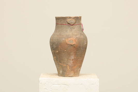 A one-of-a-kind natural Turkish vintage vase pot without a handle, crafted from terra cotta clay, this piece showcases timeless quality and antique craftsmanship, adding a unique touch of history to your space