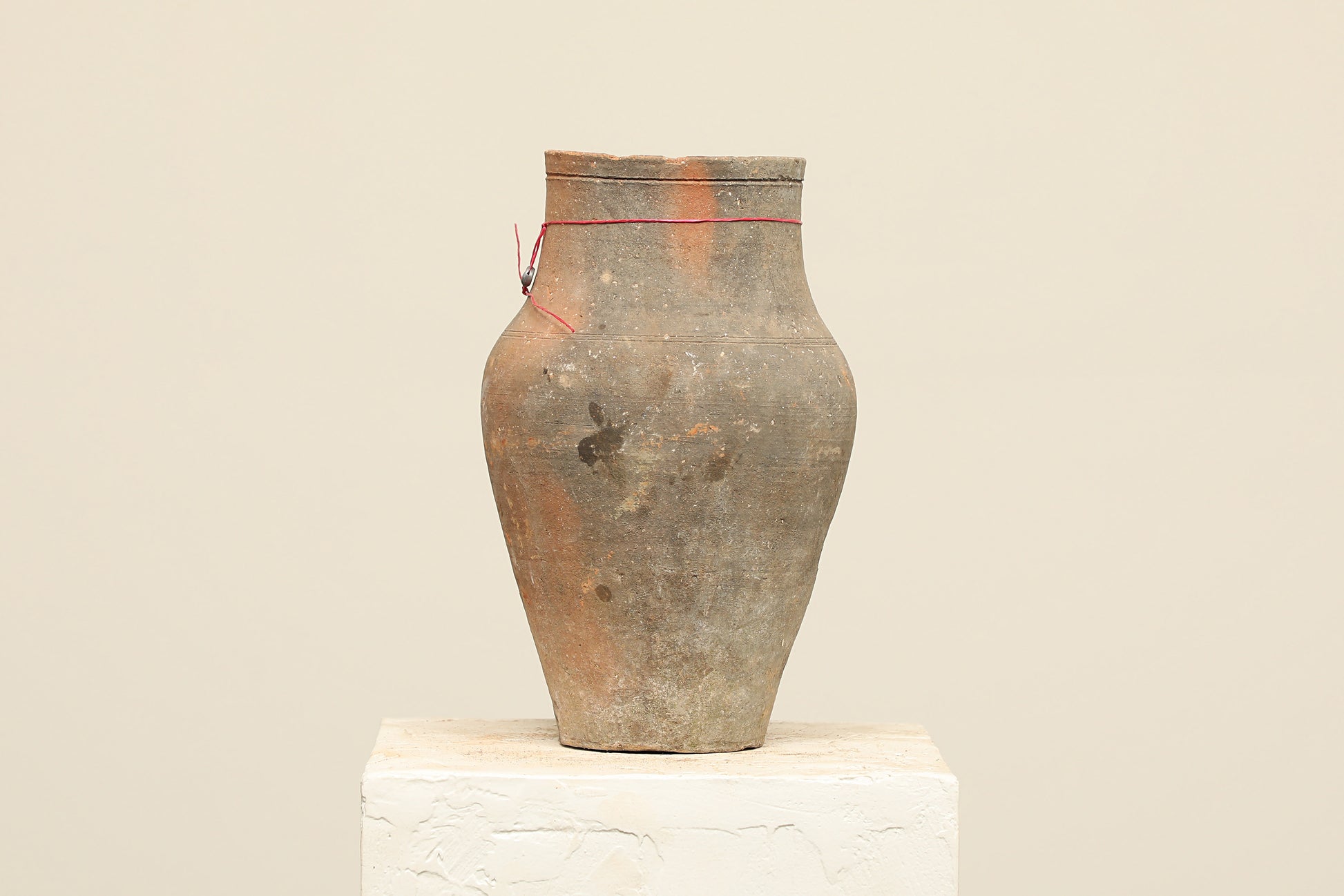 A one-of-a-kind natural Turkish vintage vase pot without a handle, crafted from terra cotta clay, this piece showcases timeless quality and antique craftsmanship, adding a unique touch of history to your space