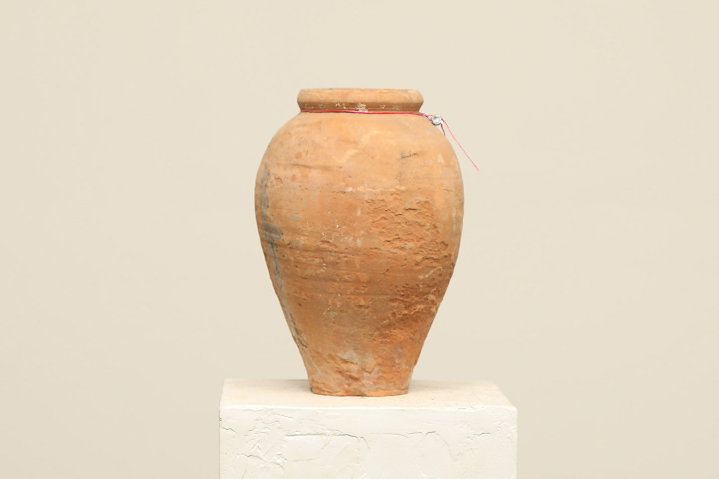 A one-of-a-kind natural Turkish vintage vase pot without a handle, crafted from terra cotta clay, this piece showcases timeless quality and antique craftsmanship, adding a unique touch of history to your space