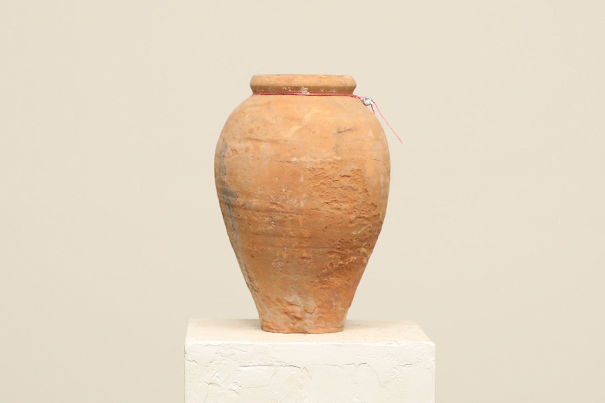 A one-of-a-kind natural Turkish vintage vase pot without a handle, crafted from terra cotta clay, this piece showcases timeless quality and antique craftsmanship, adding a unique touch of history to your space