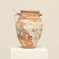A one-of-a-kind neutral Turkish vintage vase pot with a handle, crafted from terra cotta clay, this piece showcases timeless quality and antique craftsmanship, adding a unique touch of history to your space