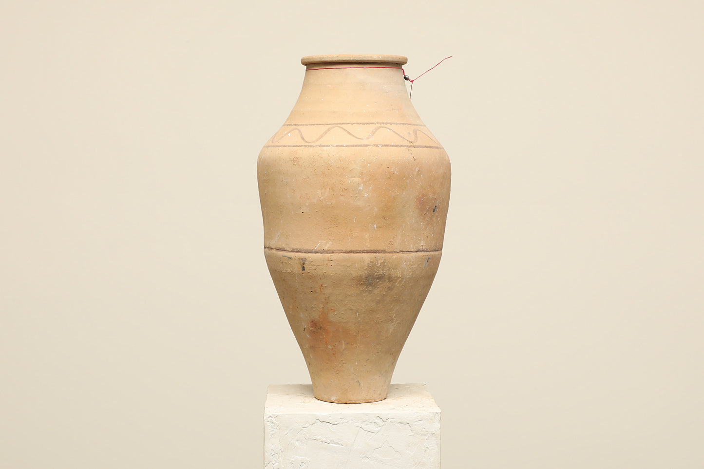 A one-of-a-kind neutral Turkish vintage vase pot without a handle, crafted from terra cotta clay, this piece showcases timeless quality and antique craftsmanship, adding a unique touch of history to your space