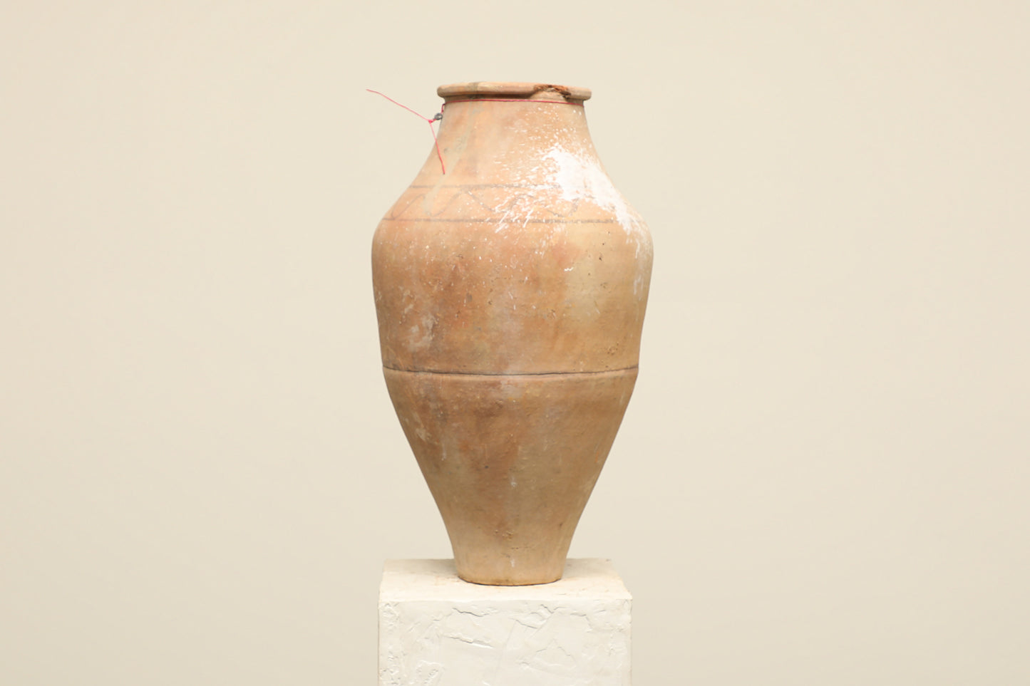 A one-of-a-kind neutral Turkish vintage vase pot without a handle, crafted from terra cotta clay, this piece showcases timeless quality and antique craftsmanship, adding a unique touch of history to your space