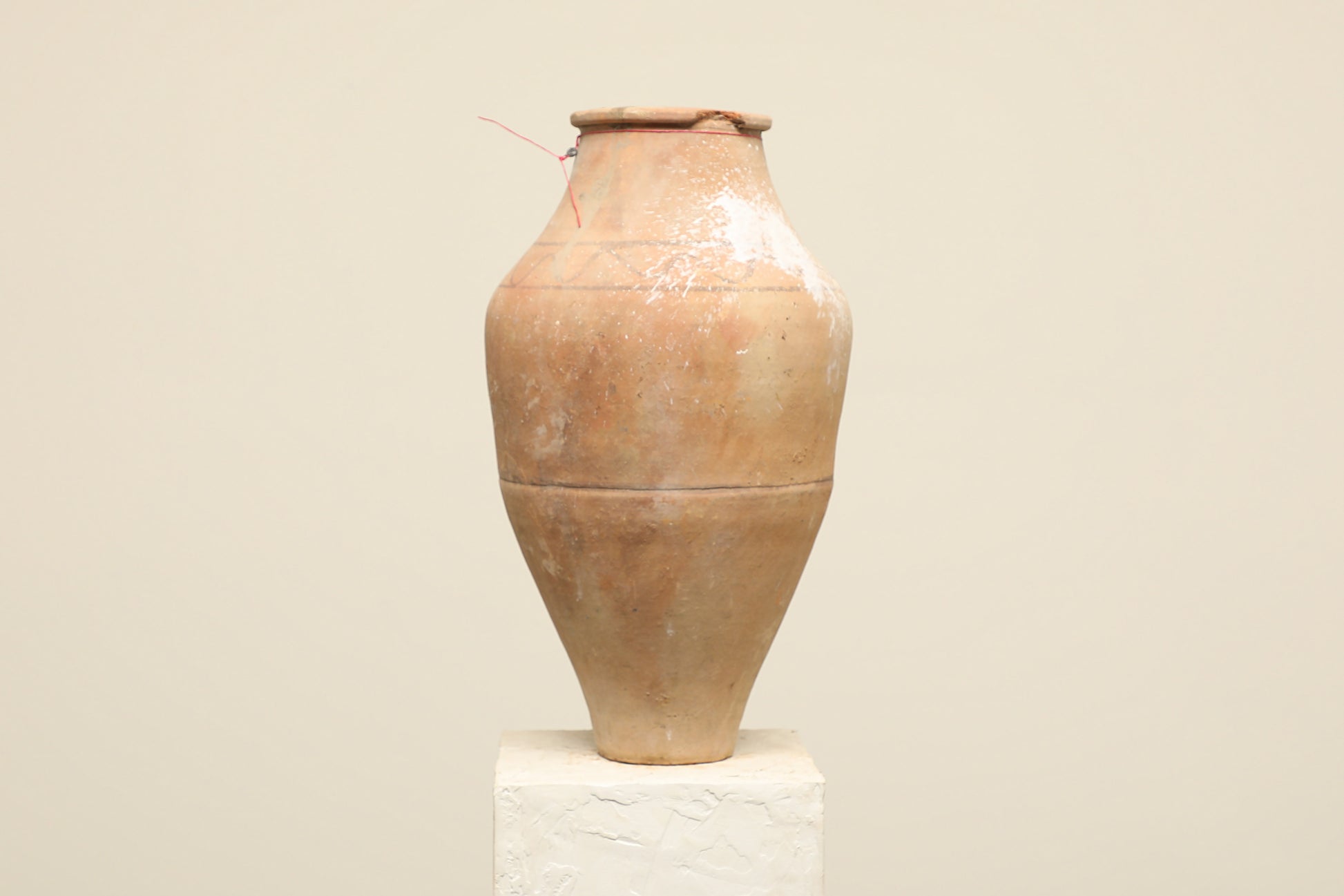 A one-of-a-kind neutral Turkish vintage vase pot without a handle, crafted from terra cotta clay, this piece showcases timeless quality and antique craftsmanship, adding a unique touch of history to your space