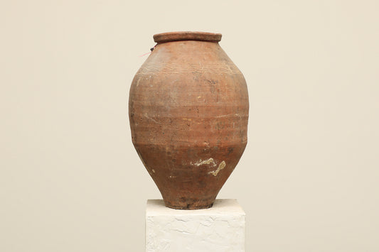 A one-of-a-kind rustic brown Turkish vintage vase pot without a handle, crafted from terra cotta clay, this piece showcases timeless quality and antique craftsmanship, adding a unique touch of history to your space