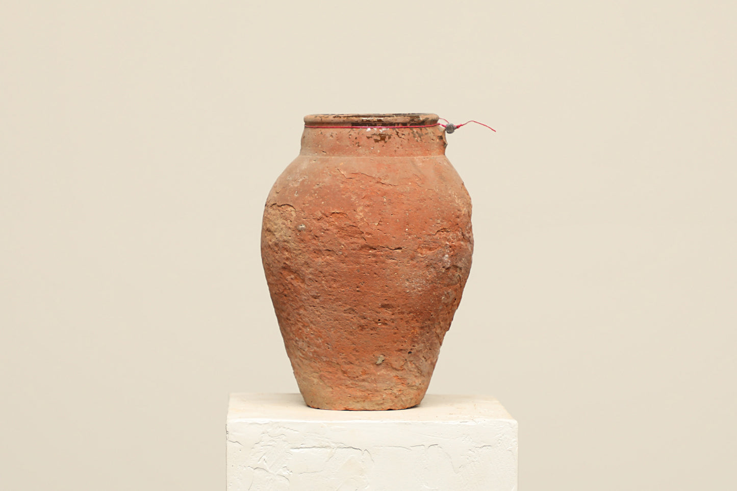 A one-of-a-kind rustic red Turkish vintage vase pot without a handle, crafted from terra cotta clay, this piece showcases timeless quality and antique craftsmanship, adding a unique touch of history to your space