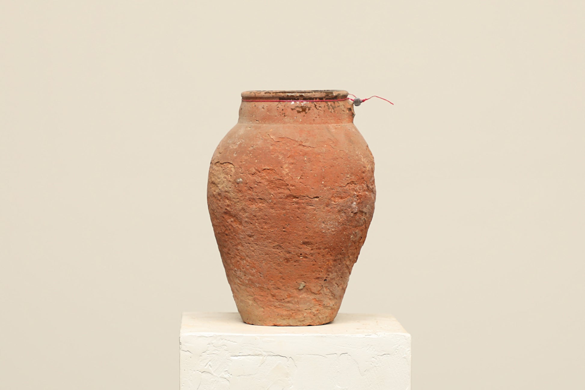 A one-of-a-kind rustic red Turkish vintage vase pot without a handle, crafted from terra cotta clay, this piece showcases timeless quality and antique craftsmanship, adding a unique touch of history to your space