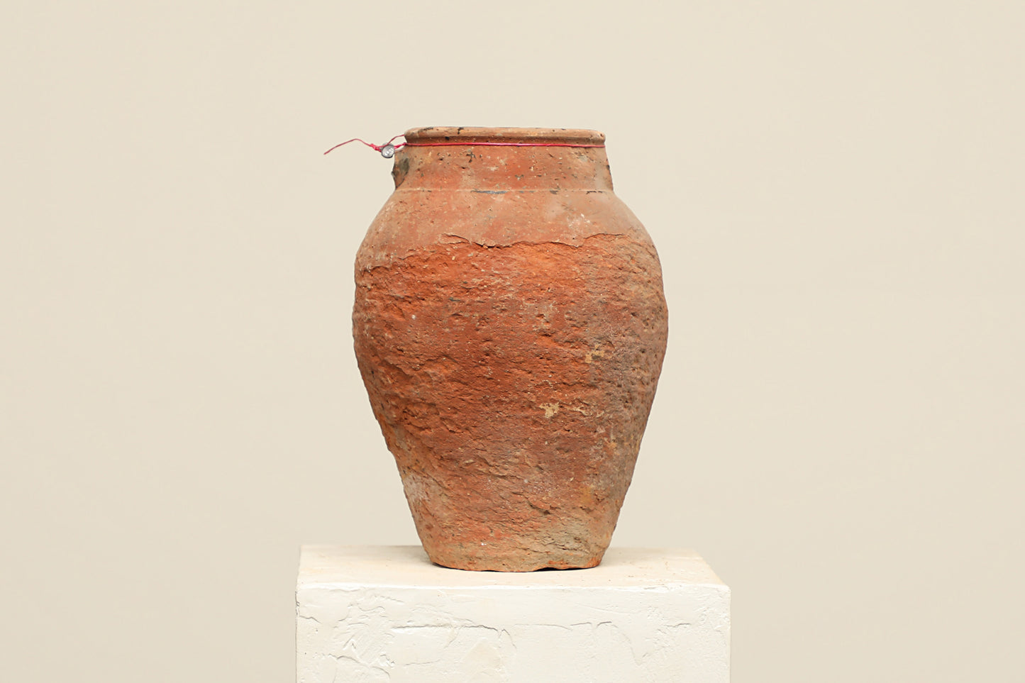 A one-of-a-kind rustic red Turkish vintage vase pot without a handle, crafted from terra cotta clay, this piece showcases timeless quality and antique craftsmanship, adding a unique touch of history to your space