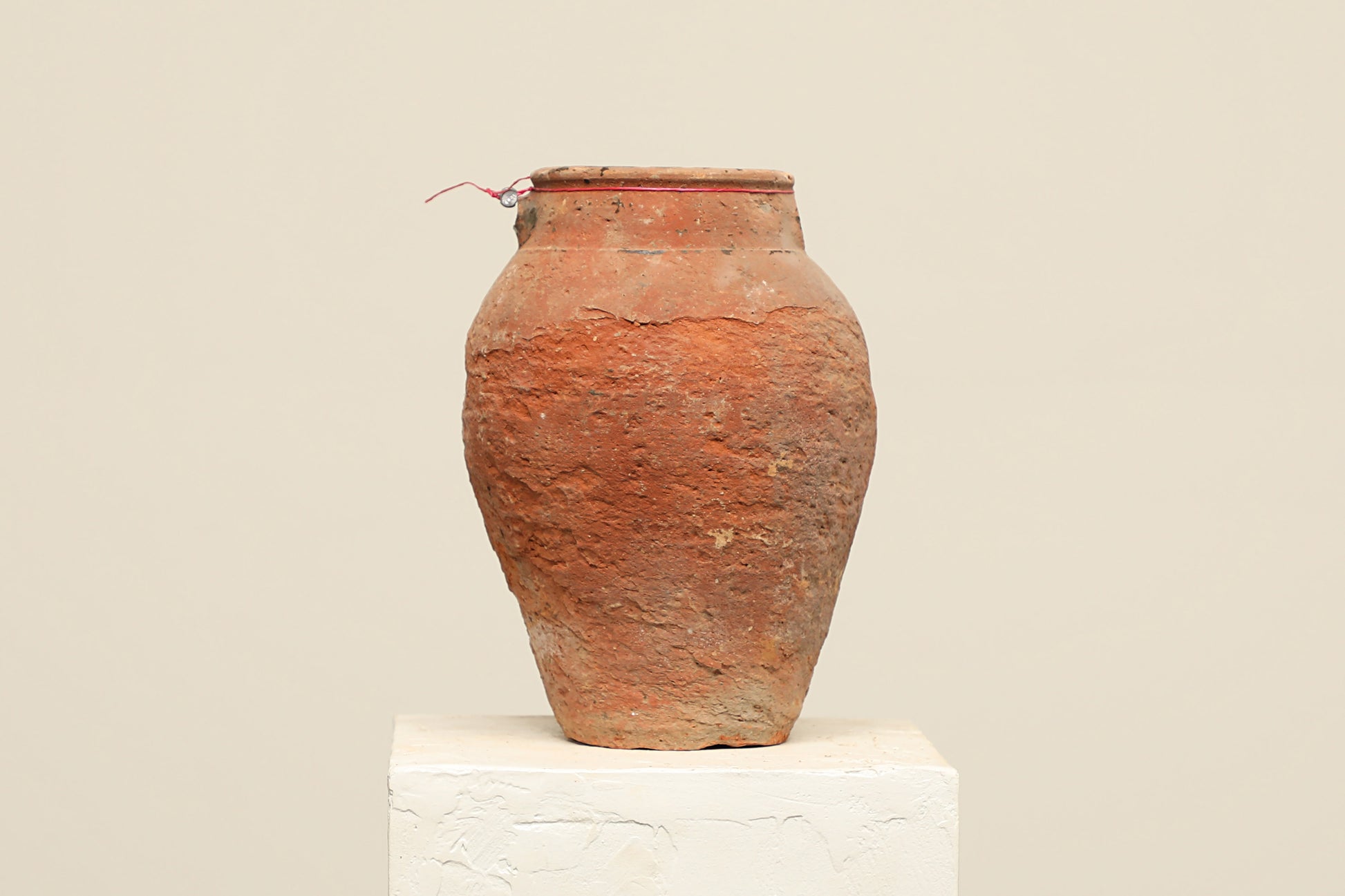 A one-of-a-kind rustic red Turkish vintage vase pot without a handle, crafted from terra cotta clay, this piece showcases timeless quality and antique craftsmanship, adding a unique touch of history to your space
