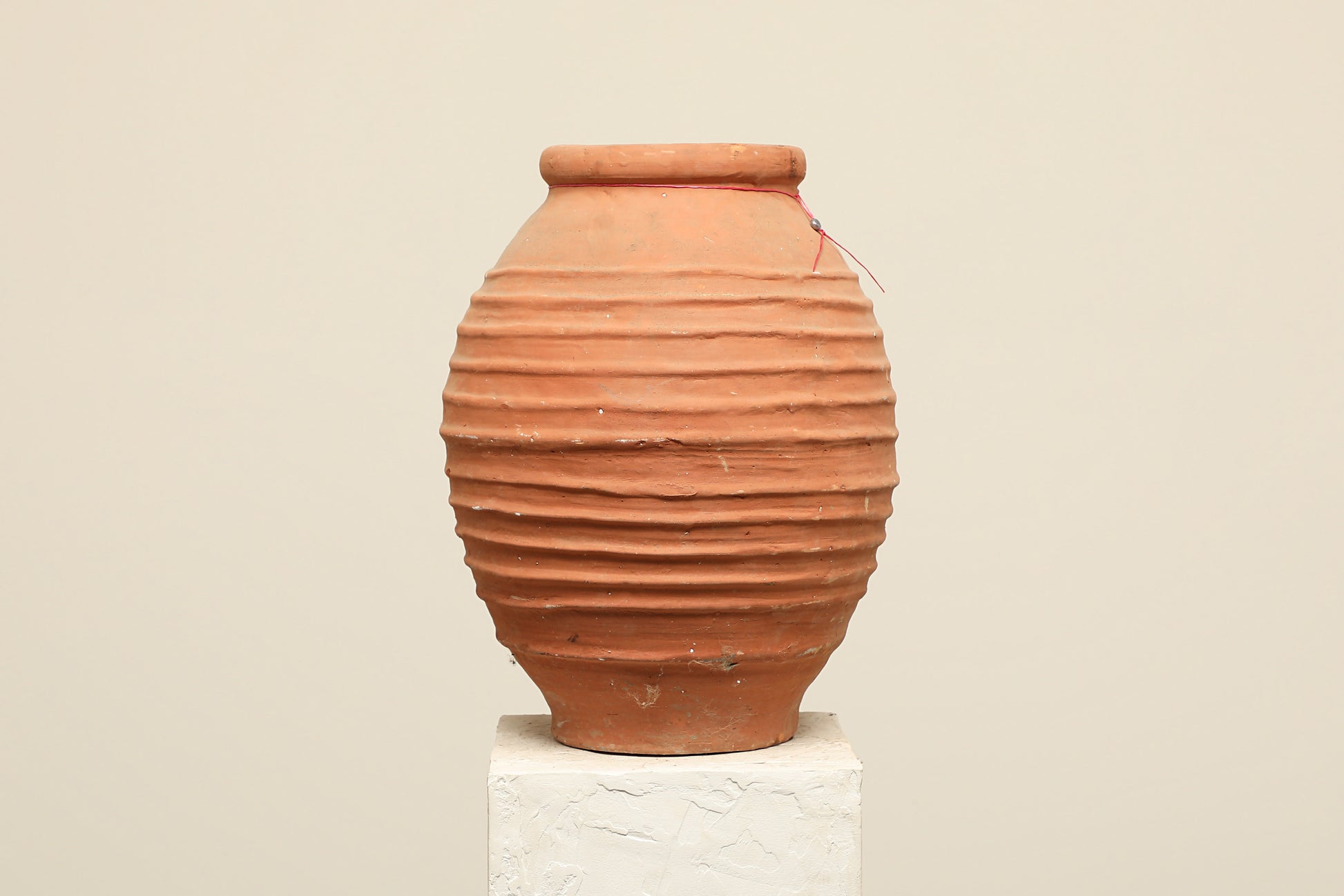 A one-of-a-kind rustic red Turkish vintage vase pot without a handle, crafted from terra cotta clay, this piece showcases timeless quality and antique craftsmanship, adding a unique touch of history to your space