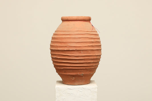 A one-of-a-kind rustic red Turkish vintage vase pot without a handle, crafted from terra cotta clay, this piece showcases timeless quality and antique craftsmanship, adding a unique touch of history to your space