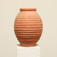 A one-of-a-kind rustic red Turkish vintage vase pot without a handle, crafted from terra cotta clay, this piece showcases timeless quality and antique craftsmanship, adding a unique touch of history to your space