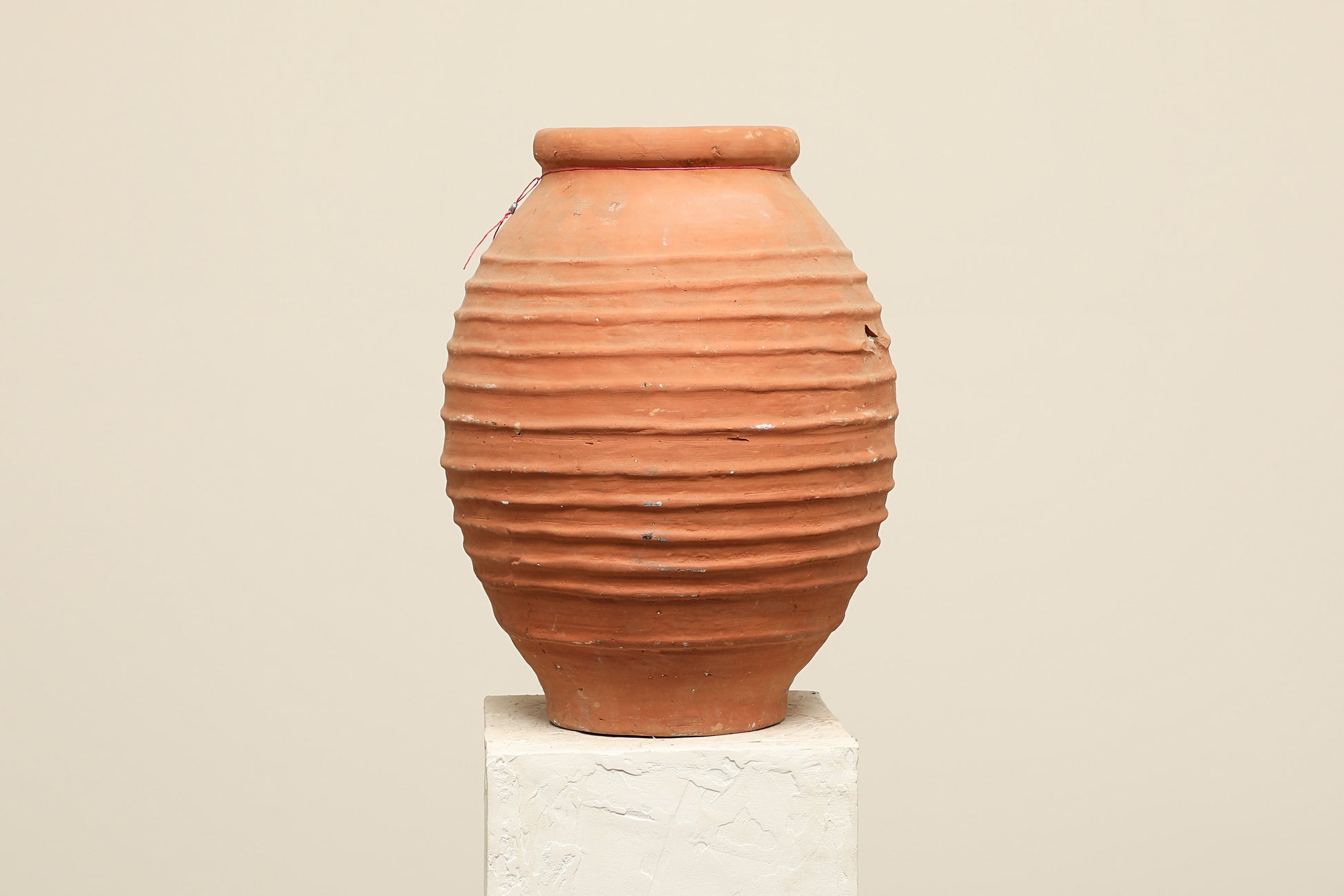 A one-of-a-kind rustic red Turkish vintage vase pot without a handle, crafted from terra cotta clay, this piece showcases timeless quality and antique craftsmanship, adding a unique touch of history to your space