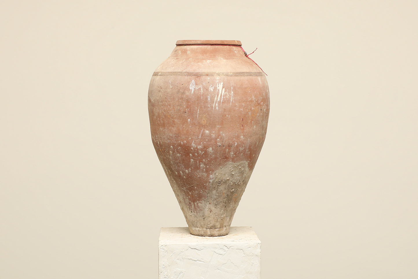 A one-of-a-kind neutral Turkish vintage vase pot without a handle, crafted from terra cotta clay, this piece showcases timeless quality and antique craftsmanship, adding a unique touch of history to your space